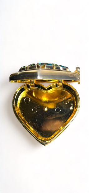 Yves SAINT LAURENT par Robert GOOSSENS Heart" poudrier
Gilded metal paved with rhinestones...