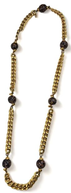 Yves SAINT-LAURENT Long necklace, circa 1990
Gilded metal with gourmet links adorned...