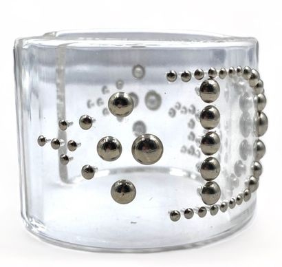 DIOR Cuff bracelet, circa 2000
Translucent plexiglass
Embellished with metal pastilles...