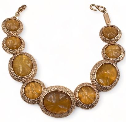 Yves SAINT LAURENT Necklace with circular motifs, circa 1980
Copper-patinated metal
Orange...