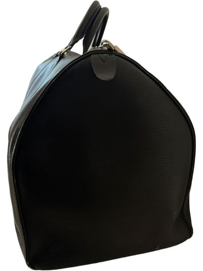 Louis VUITTON KEEPALL 60 bag, 2011
Black herringbone leather
Silver-plated metal...