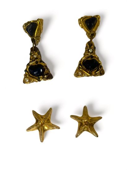 null Lot of costume jewelry including:

Pair of gold-plated resin "star" ear clips,...