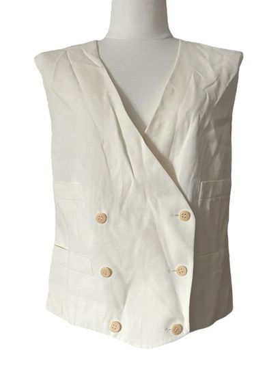 GIORGIO ARMANI Gilet de costume
Viscose blanc cassé
Taille indiquée 38

Très bon...