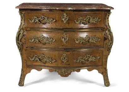 null Chest of drawers known as "tomb".

with curved front and sides, veneered with...