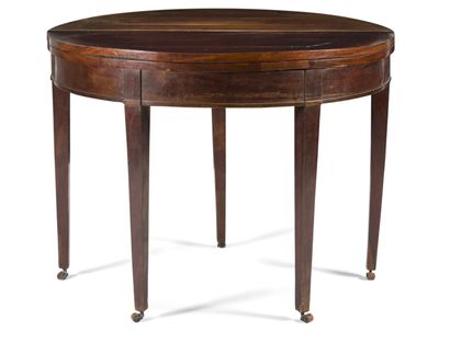 null Early 19th century half-moon console table.
In mahogany and mahogany veneer...