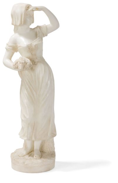 null G. Lévy (XIXe-XXe siècle)
Paysanne aux fleurs 
Sculpture en albâtre
H.: 40 cm...