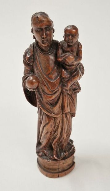 null Virgin and Child in turned wood. 
18th c. work
H. 13 cm
(chip and missing b...