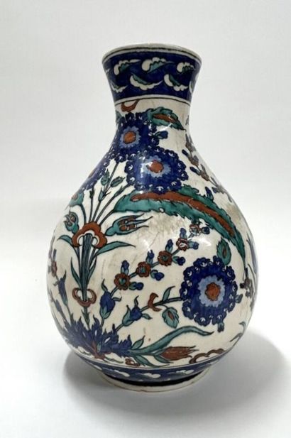 null Porcelain flared-neck vase enamelled in polychrome with Iznik decoration
Work...