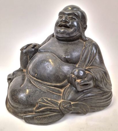 null Seated Buddha sculpture in hard stone
He holds a ball in his left hand, a symbol...