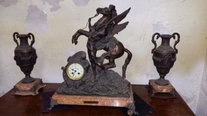 null Pendule bronze et régule dorée "au chasseur"