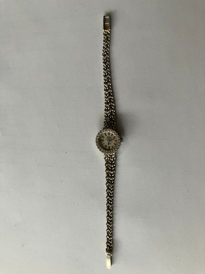 null TISSOT 
Montre-bracelet de dame en or gris 18 carats (750/1000 ‰)
Cadran circulaire...