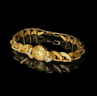 null OMEGA
Montre bracelet en or jaune 18 carats (750/1000‰) 
Cadran circulaire à...
