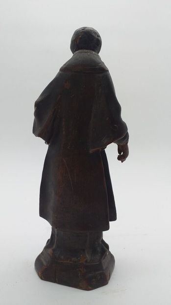 Statuette en bois sculpté et patiné représentant saint Étienne Statuette en bois...
