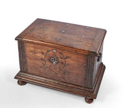 Coffre Chest 
Carved oak and metal rhombuses, with plant decoration, standing on...