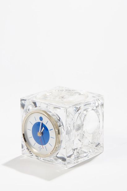 DAUM FRANCE DAUM FRANCE
Crystal clock with white and blue enamelled circular dial...