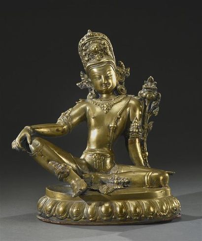 TIBET - XXe siècle Déesse Tara en bronze, assise en position de lalitasana, le fond...