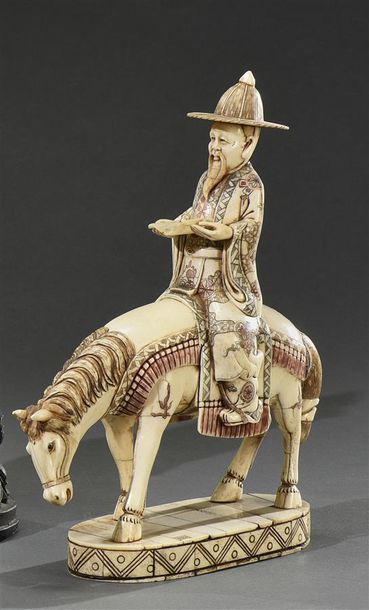 CHINE - XXe siècle Toba sur sa mule, groupe en placage d'os de chameau rehaussé de...
