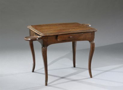 null Rectangular walnut game table, the belt has two swivelling torch holders and...