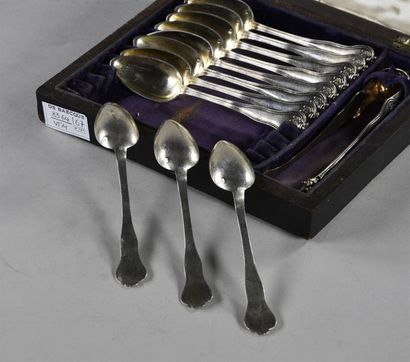 null Suite of eleven dessert spoons and a vermeil sugar tongs, the violated handle...