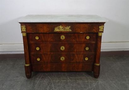 null Mahogany veneered chest of drawers opening with three drawers on the front and...