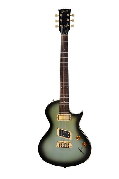 null Guitare GIBSON USA NightHawk Landmark, prototype 2 micros, Navajo Turquoise,...