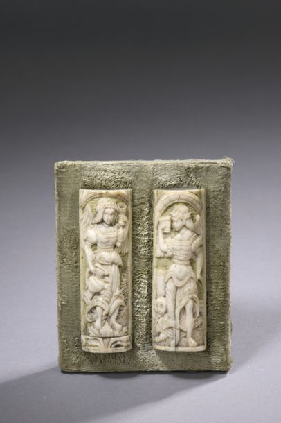 null PAIR OF CARVED BONE PLATES representing angels with attributes Italy, 16th century...