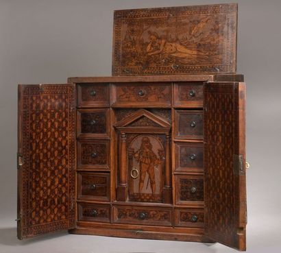 null CABINET in cypress wood carved in flat and enhanced with ink opening with two...