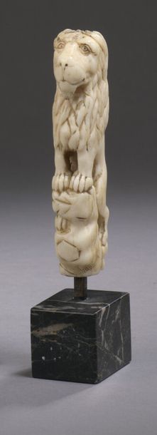 null BONE KNIFE HANDLE carved in the round representing a standing lion standing...