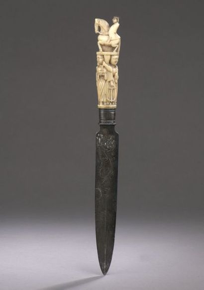 null KNIFE with carved ivory handle decorated with the three theological virtues...