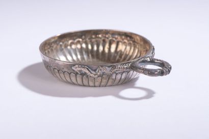 null WINE TASTE in silver decorated with gadroons, the handle formed by two snakes...