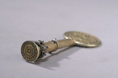 null PIPE KEY BRACE in the shape of a key in vermeil decorated with Rhine stones,...