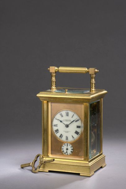 null TRAVELING PENDULUM forming an alarm clock, ringing on a gong, the brass cage...