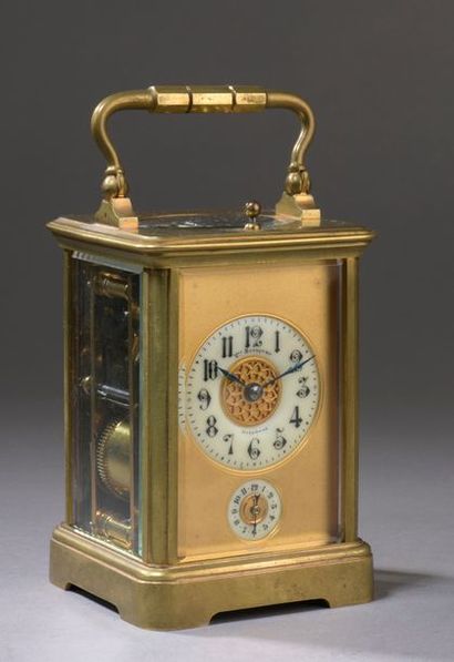 null TRAVEL PENDULUM forming an alarm clock, ringing on a gong, the brass cage frame...