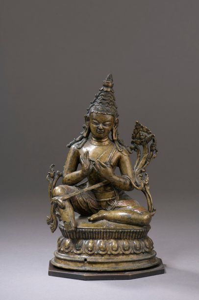 null TIBET - 15th / 16th century Brass statuette inlaid with copper and silver of...