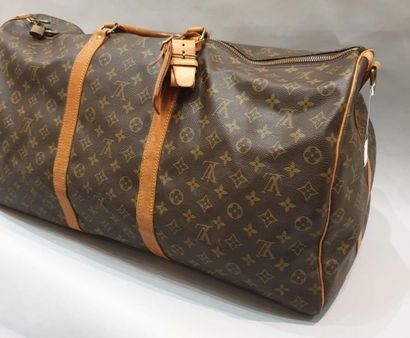 null LOUIS VUITTON 
Sac Keepall 60 en toile monogramme et cuir naturel, double poignée,...