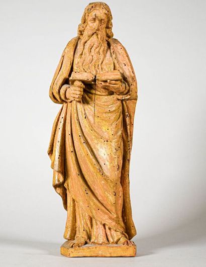null Wooden sculpture representing a saint in reading XVIIth century H. 35,5 cm Stitches,...