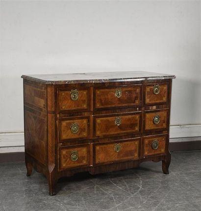 null An inlaid chest of drawers with three drawers in the belt and two drawers, the...