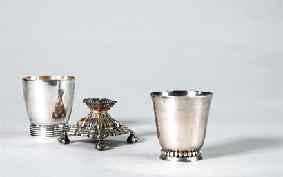 null Silver lot including : - a monogrammed silver kettledrum, the foot decorated...