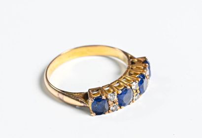 null American Half-Alliance in yellow gold

14k (525 thousandths) set with blue and...