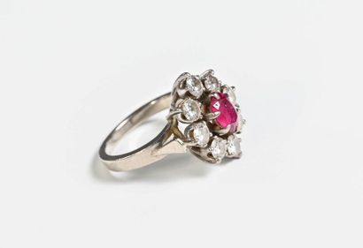 null White gold daisy ring

18k (750 thousandth) set with a central ruby in a brilliant...