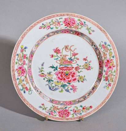 null CHINA Pair of porcelain plates in rose family enamels with peony decoration...
