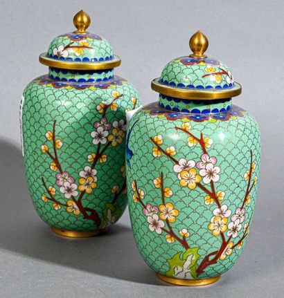 null CHINA
Set of cloisonné enamel vases consisting of a pair of small covered vases,...