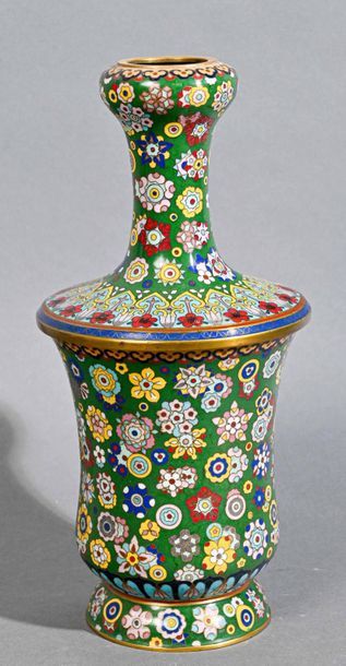 null CHINA
Set of cloisonné enamel vases consisting of a pair of small covered vases,...