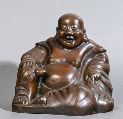 null CHINA Buddha in patinated bronze and polychrome (wooden base)

Late 19th - early...