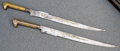 null Pair of Moroccan kriss in steel and brass engraved
L. 36,5 cm