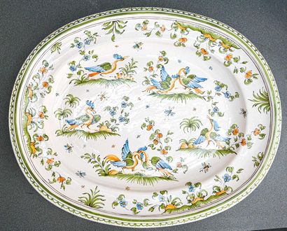 null MOUSTIERS

Large modern dish decorated with birds on mounds Modern period

Signed...