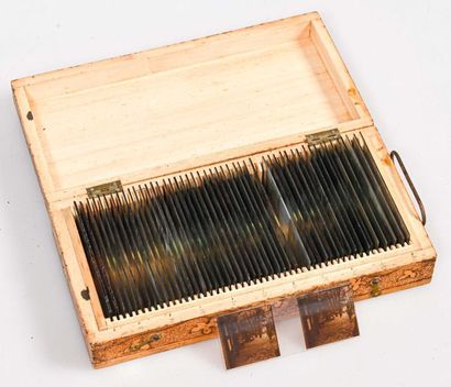 null Grooved wooden filing box with 50 positive stereoscopic views, c. 1910.
Wooden...