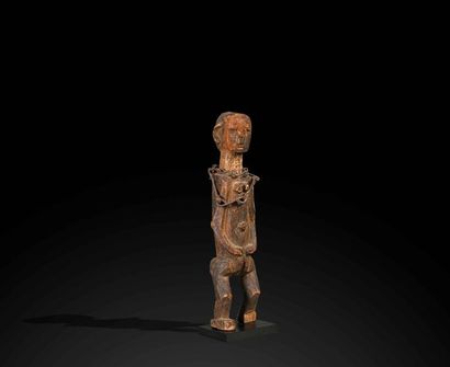 null Dogon statuette, from the Seno Plain

MALI

Wood, dark sacrificial patina, iron...
