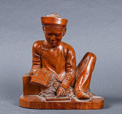 null VIETNAM - XXe siècle
Le comptable 
Sujet en bois sculpté dans le goût des sculptures...