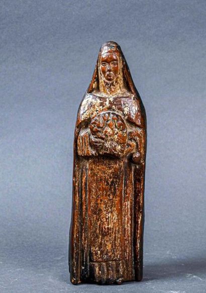 null Sainte en chêne sculpté polychrome
Travail rustique du XVIIIe siècle
H. 21 cm...
